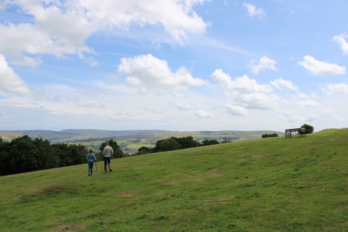 Sarah and Mark Holland walking down the Holland family farm.